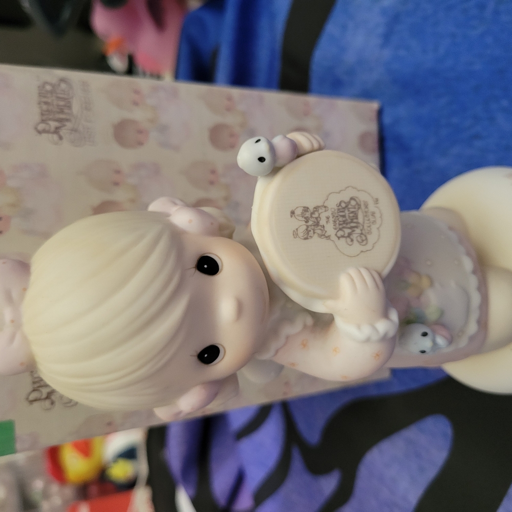 Adorable Figurine with Embroidery Hoop